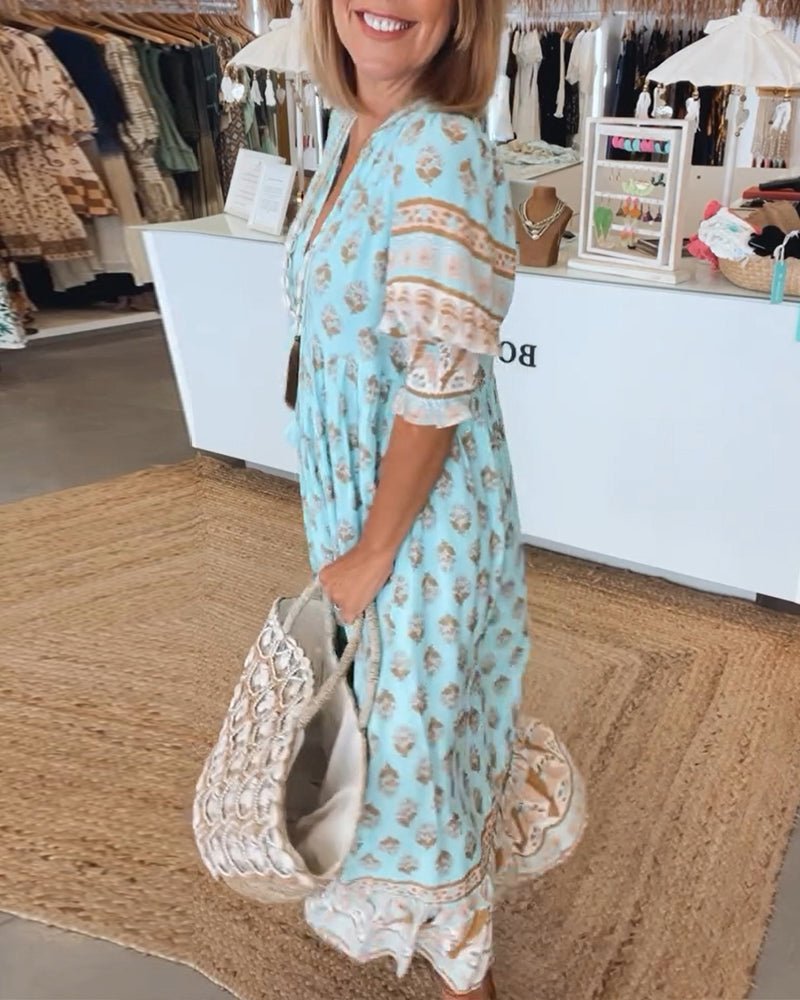 MANA | ABITO MIDI FLOREALE CHIC CON COLLO A V