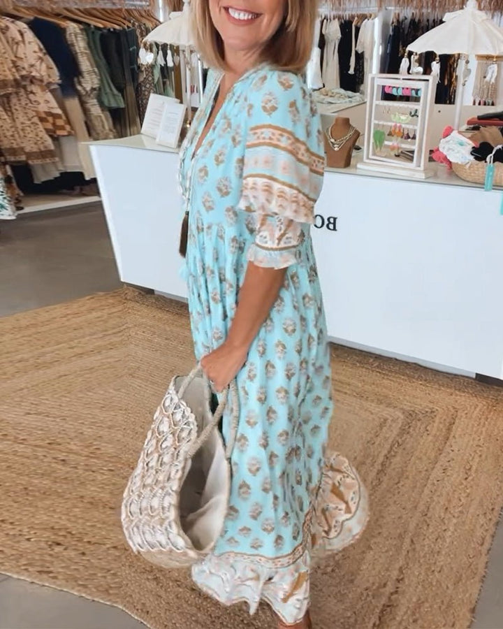 MANA | ABITO MIDI FLOREALE CHIC CON COLLO A V
