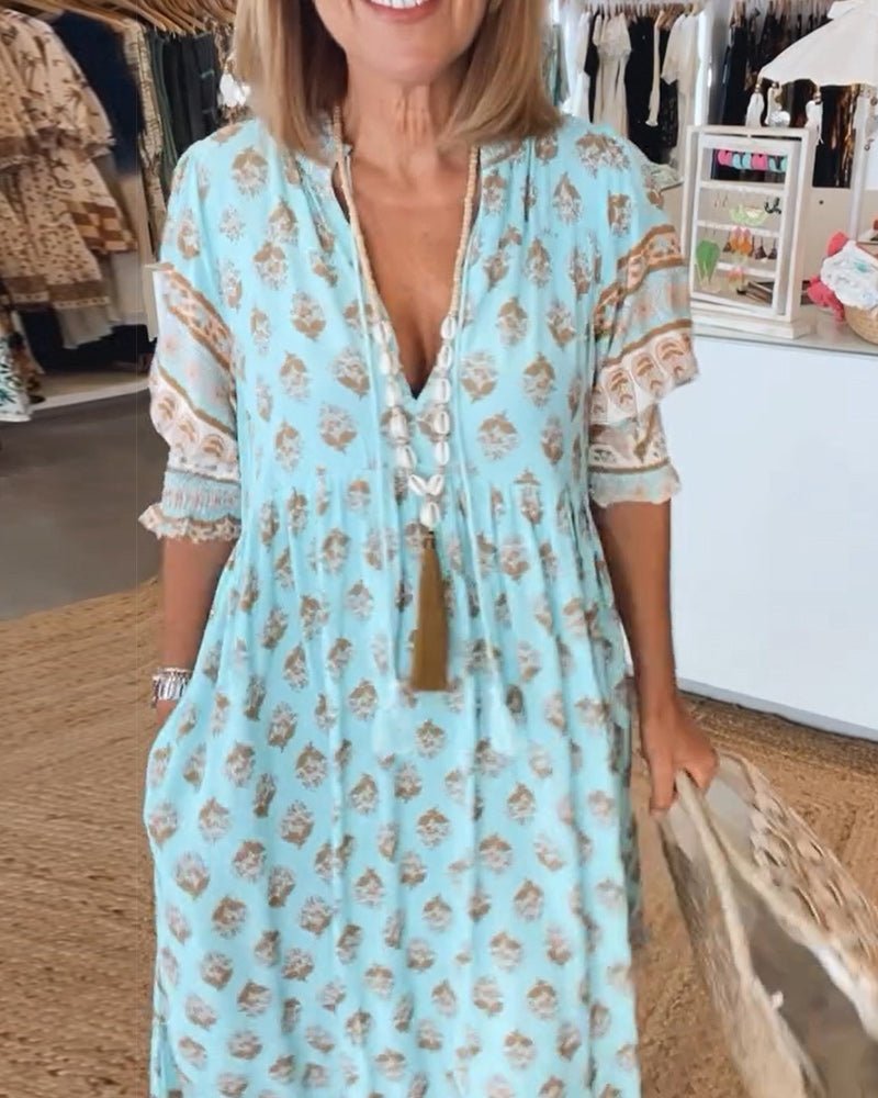 MANA | ABITO MIDI FLOREALE CHIC CON COLLO A V