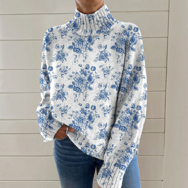 Sarah | Maglione a collo alto bianco e blu con motivo floreale